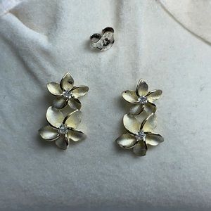 *SOLD* Sterling silver plumeria post earrings.